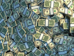 pile of dollar bill bundles