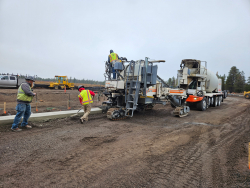 Curb installation at S Century Dr and Huntington Rd roundabout_112125