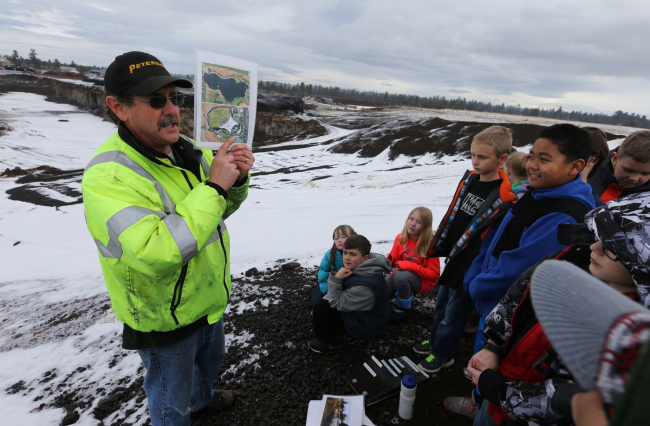 Photo of people at landfill