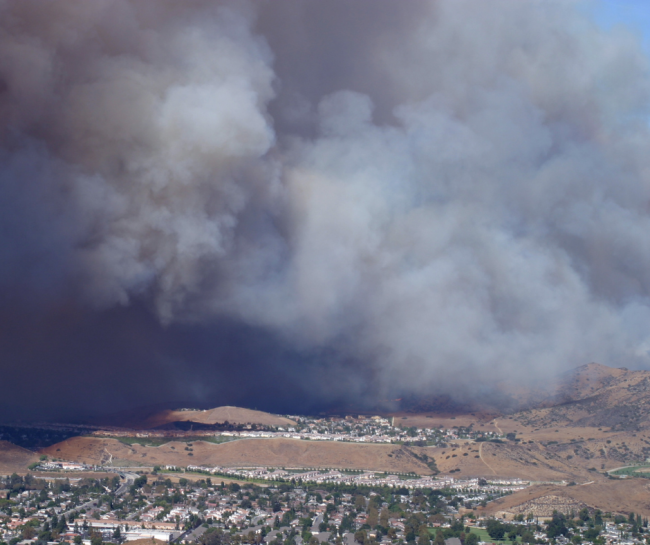 Wildfire smoke over a community